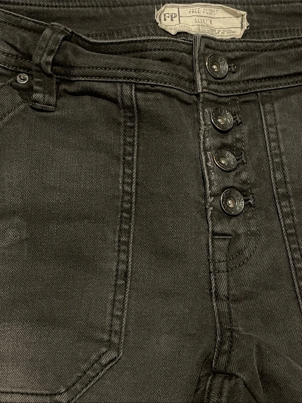 Free People Black Washed Skinny Jeans with Subtle Distressing